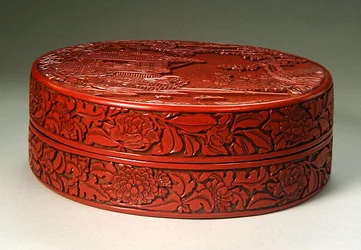 Geschnitzte runde Zinnoberschachtel mit Deckel